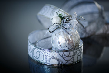 Christmas card with silver balls and ribbon