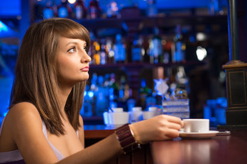 woman with a cup of coffee
