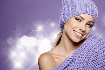 Beautiful winter woman in warm clothing