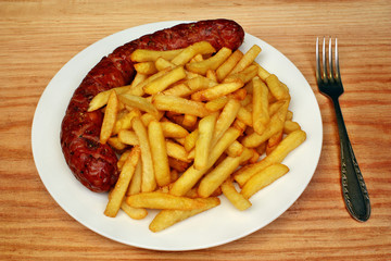 Fried fries with roasted sausage