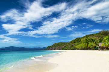 Fototapeta na wymiar White sand beach. Malcapuya island, Philippines