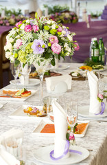 table ware glass glasses and fresh flowers