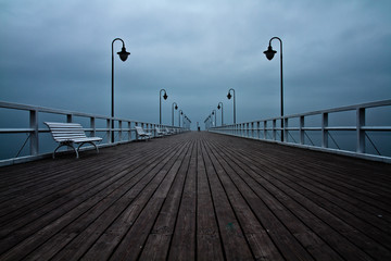 Beautiful colorful Sunrise on the pier at the seaside, Gdynia