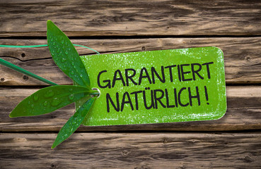 Garantiert natürlich! grüne Plakette aus Kartonpapier