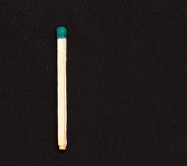 match on a black background. macro