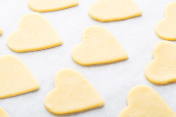 Fototapeta na wymiar Heart shaped raw cookie dough