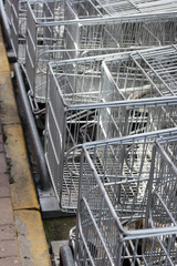 Empty shopping trolleys in a market