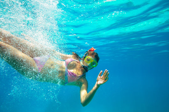 Underwater shoot of a young lady snorkeling