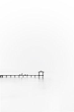 Fototapeta Fishing jetty in black and white