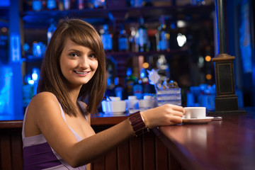 woman with a cup of coffee