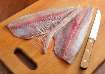 Fillet of a herring and skeleton.