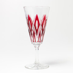 Champagne glass with red accents - isolated