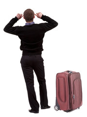 Businessman traveling with suitcas