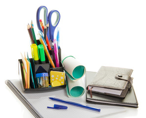 Office supplies in a support and organizer