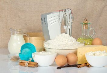 Mixer, sieve and products for dough