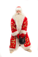 Santa Claus raises a cast iron weight.