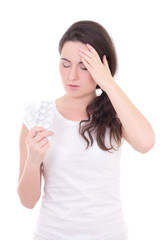 young attractive woman with headache showing package of tablets