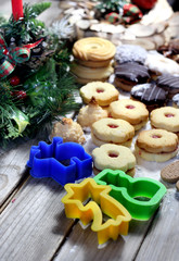 Mix of Christmas cookies with cinnamon and candle