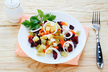 vegetable salad with pickled cucumber