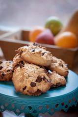 Chocolate chip cookies on a vintage cake stand
