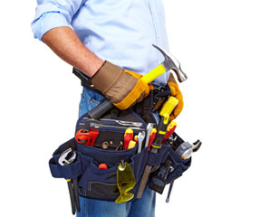 Worker with a tool belt. Construction.