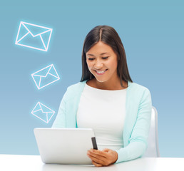 businesswoman or student with tablet pc © Syda Productions
