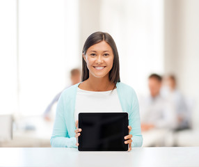 businesswoman or student with tablet pc © Syda Productions