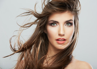 Fototapeta premium Woman face with hair motion on white background