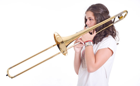 Teenage Girl Playing The Trombone