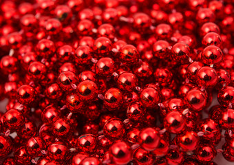 Christmas garland made from small red beads.