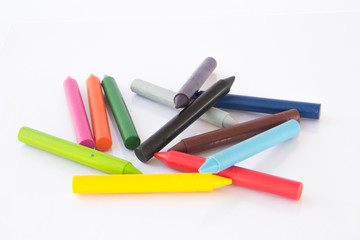colored wax crayons isolated