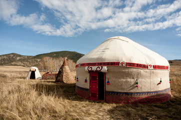 Kazakh yurt in the autumn steppe - obrazy, fototapety, plakaty