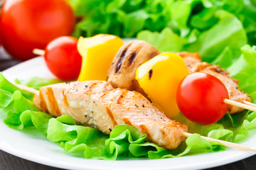 Grilled salmon and vegetable skewers