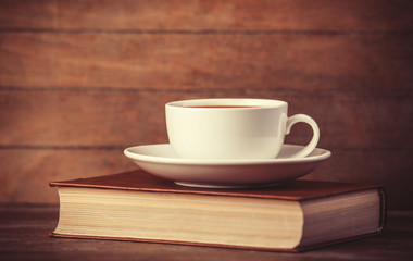 Cup of coffe with book