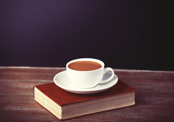 Cup of coffe with book