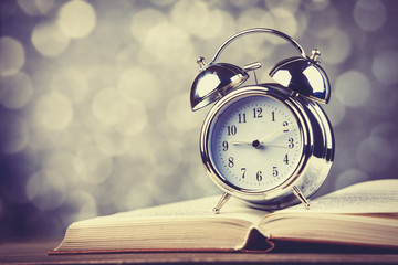 Alarm clock and book