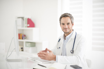 young doctor at his office