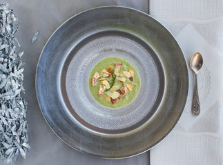 Cream asparagus with almonds and bacon, selective focus