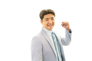 ガッツポーズの男性