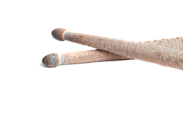 Chipped drumstick on white background