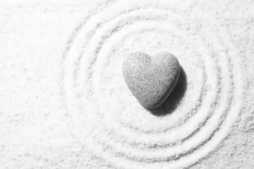 Printed roller blinds Stones in the sand Grey zen stone in shape of heart, on sand background