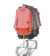 female clothes hanging on clothes rack