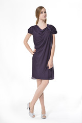 Fototapeta premium Full length Portrait of beautiful young woman posing