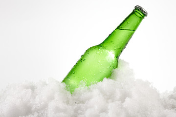 beer bottle in snow