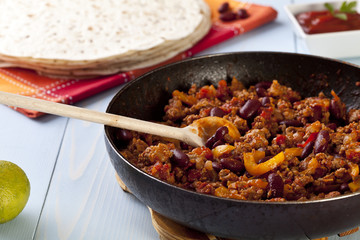 burritos wraps with meat beans and vegetables