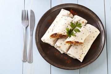 burritos wraps with meat beans and vegetables