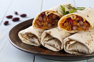 burritos wraps with meat beans and vegetables