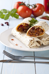 burritos wraps with meat beans and vegetables