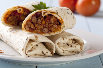 burritos wraps with meat beans and vegetables