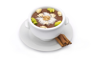 Lebanese traditional dessert meghli isolated on white